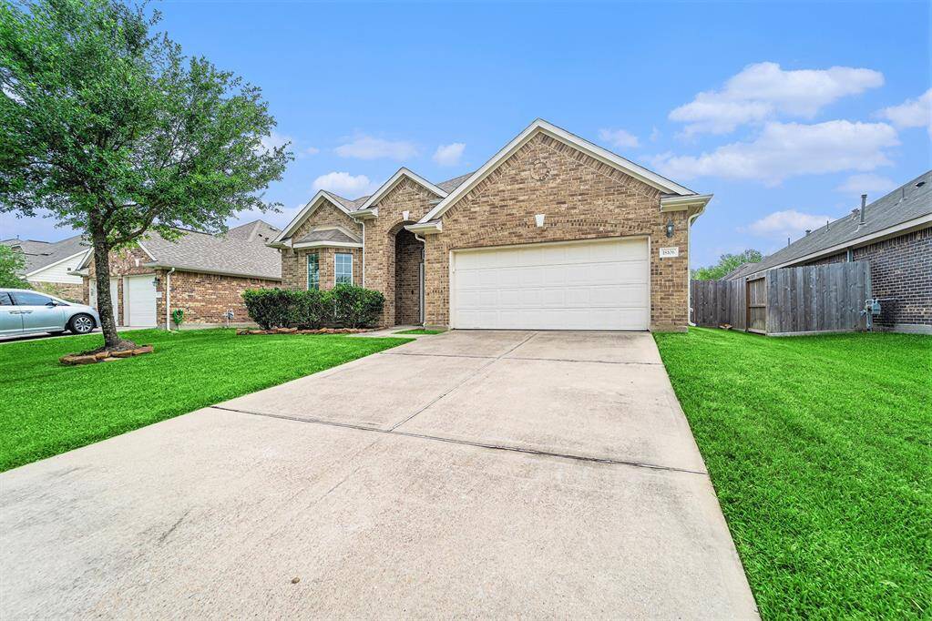This stunning home features 3 beds, 2 baths, a flex room, and an attached 2-car garage.