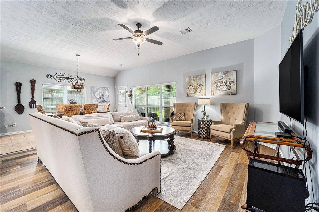 This living room also overlooks the amazing backyard!