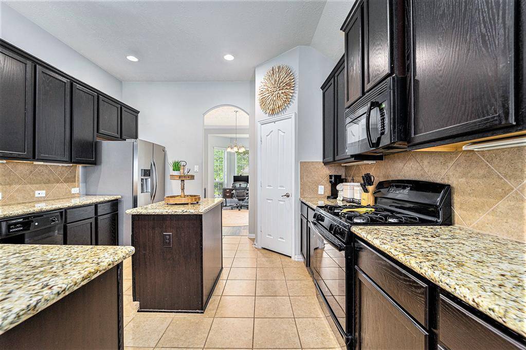 This wonderful kitchen also has a walk-in pantry!