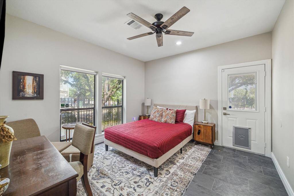 Secondary bedroom with access to yard