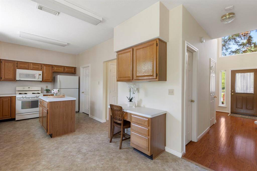 Additional cabinets and functional desk area add to usefulness of every space in the kitchen. The home has abundant storage with multiple large closets throughout.