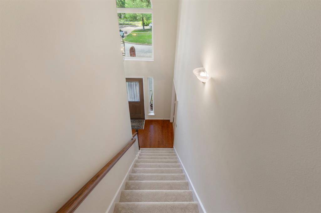 The stairs lead from two story entry to the game room and three bedrooms.