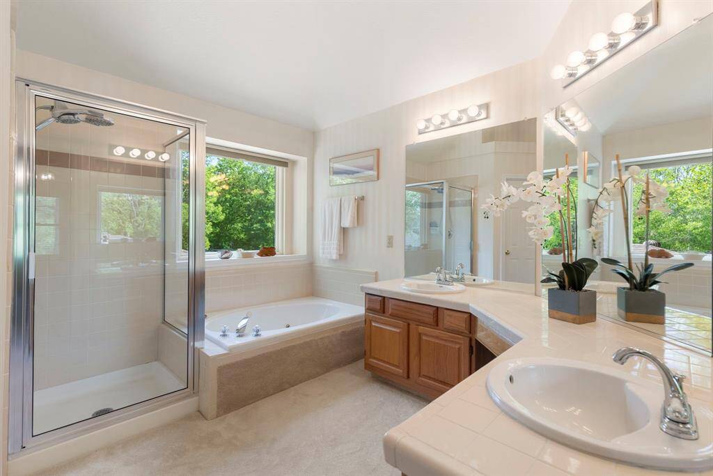 Bright and light filled, the en-suite is also spacious making it functional for everyone to prepare for the day ahead or to rest and relax.