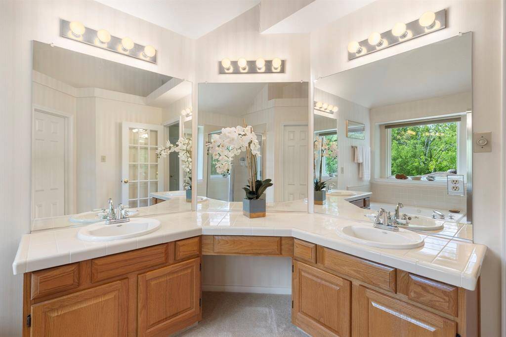 The room is incredibly welcoming and light filled but also functional with abundant cabinets and storage.