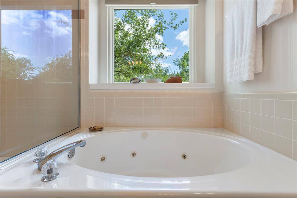 Watch the clouds and leaves of the mature trees as you rest and relax in the jetted spa tub after a hard days work.
