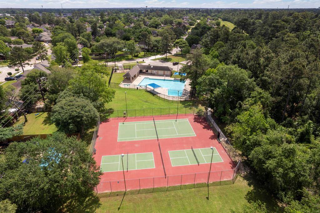 Tennis or pickle ball is conveniently located just a short distance from 18302 Fernbluff Dr.