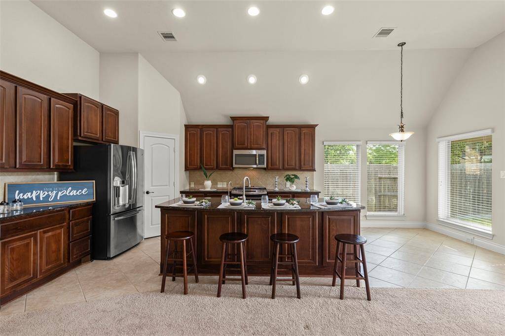 Amazing Staggered Cabinetry and Ample Counter Space in this Large Kitchen