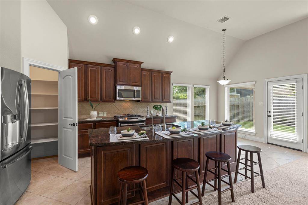 Granite Counters with Matching Stainless Steel Appliances