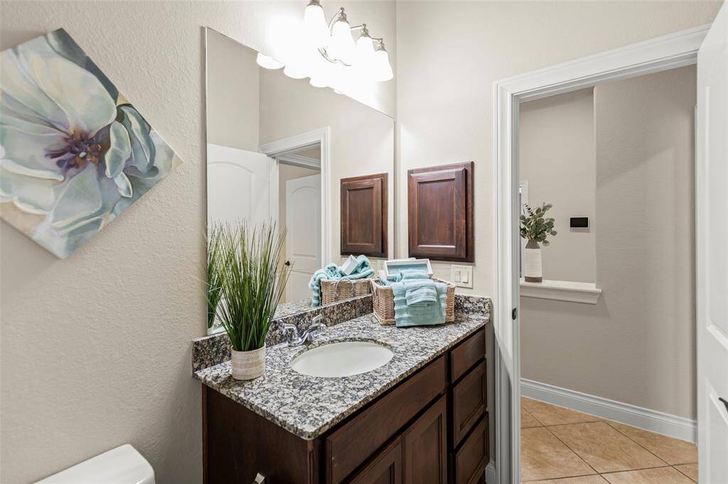 Large Granite Countertop with Beautiful Fixtures and Extra Cabinet for your Storage Needs
