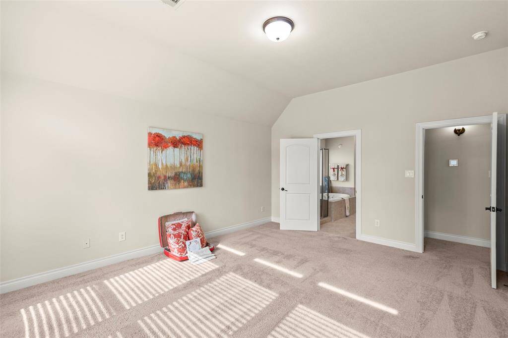 Spacious Primary Bedroom with Ample Natural Lighting