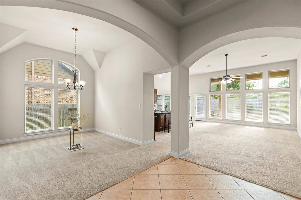 Open Dining Room with a Beautiful View and Natural Lighting.