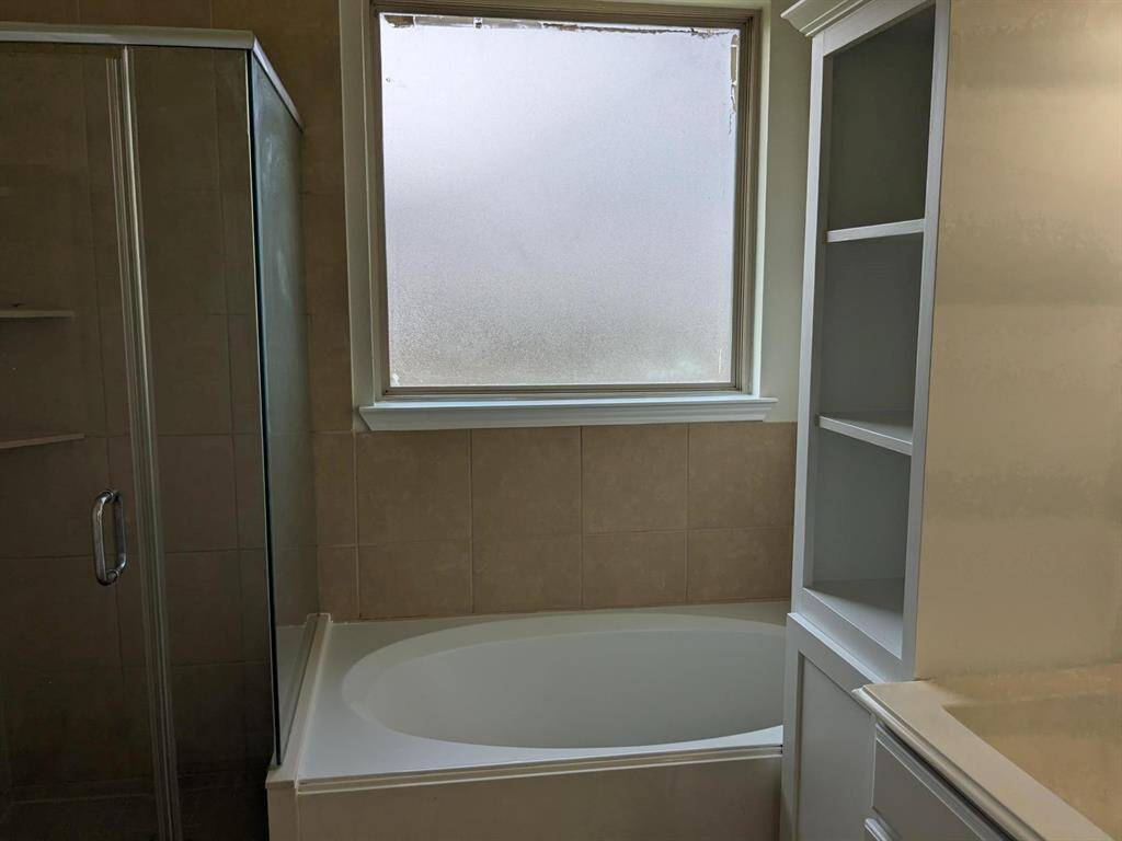 . . . soaking tub and separate shower