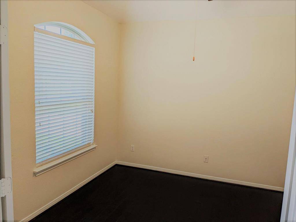 Off the entrance is a flex room that can be conveniently used as a home office