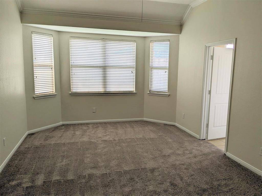 Well proportioned Master bedroom with recent carpet