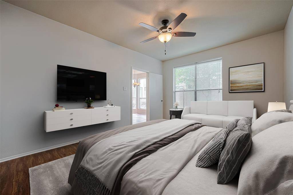 Experience the spacious allure of the virtually enhanced primary bedroom.  This seamless blend of space and design creates a welcoming atmosphere ideal for relaxation and entertaining!