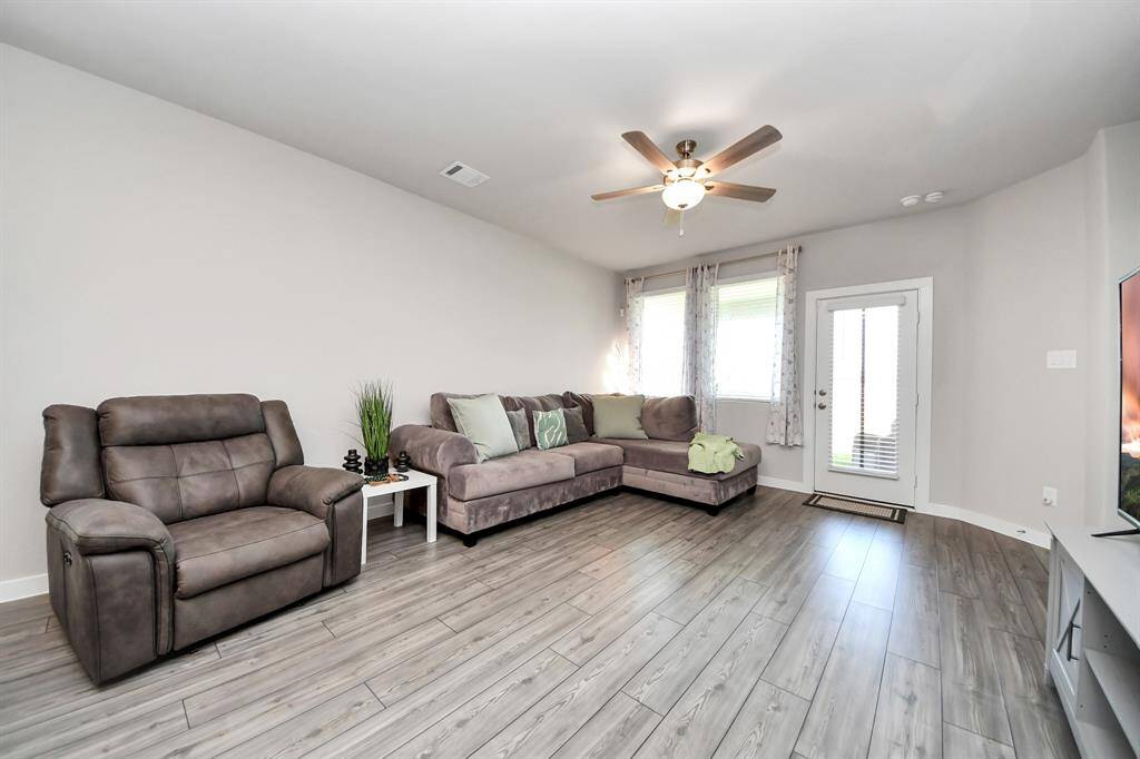 Living room with door to back patio