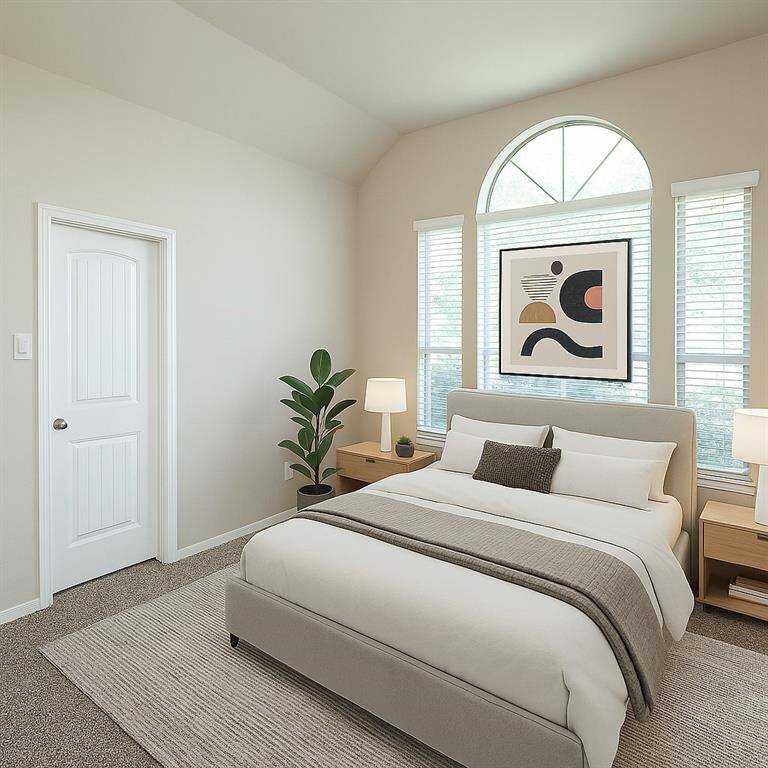 Cozy and inviting, Bedroom 3 features ample natural light and modern decor, perfect for relaxation. Virtual staging was used.