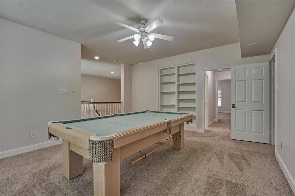 The media room sits just off the game room and is ready for all your media room equipment!