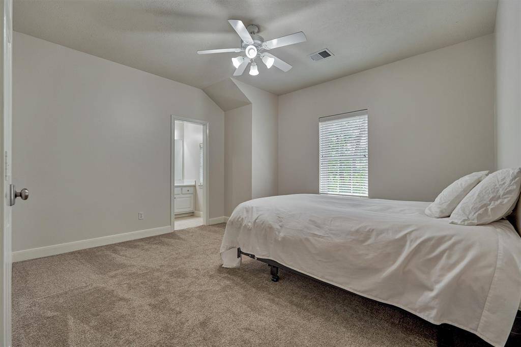 Jack & Jill bathroom connects two secondary bedrooms.