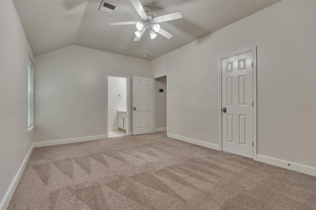 Secondary bedroom #3 features plush carpeting, ceiling fan, and walk-in closet. Note: access to Jack & Jill bathroom.