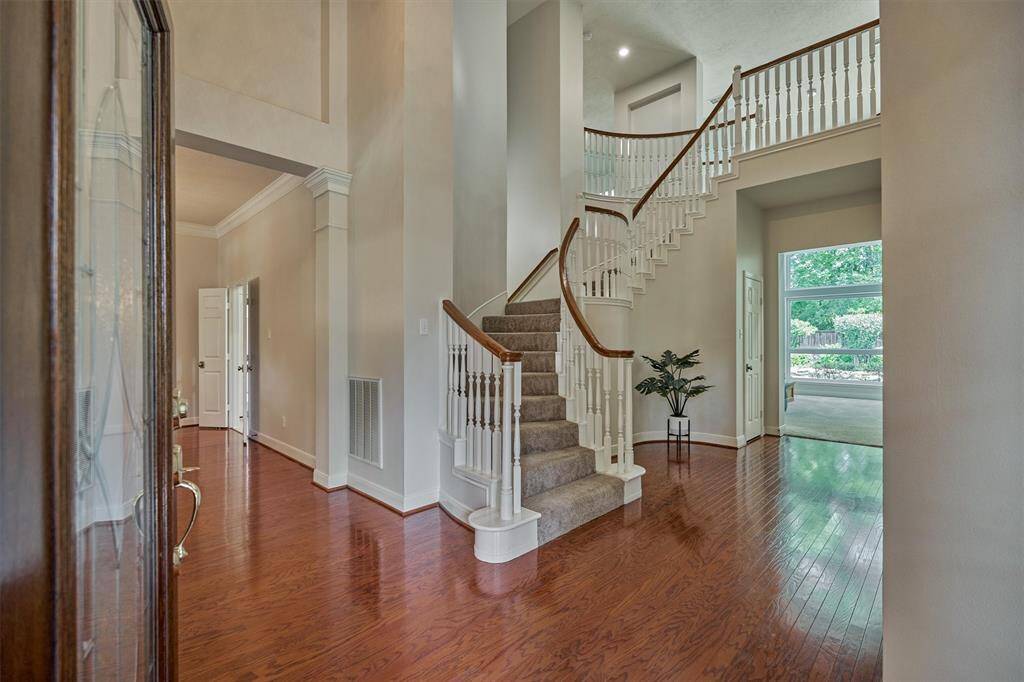 Step inside to the grand two-story foyer/entryway with sightlines into the expansive backyard oasis!