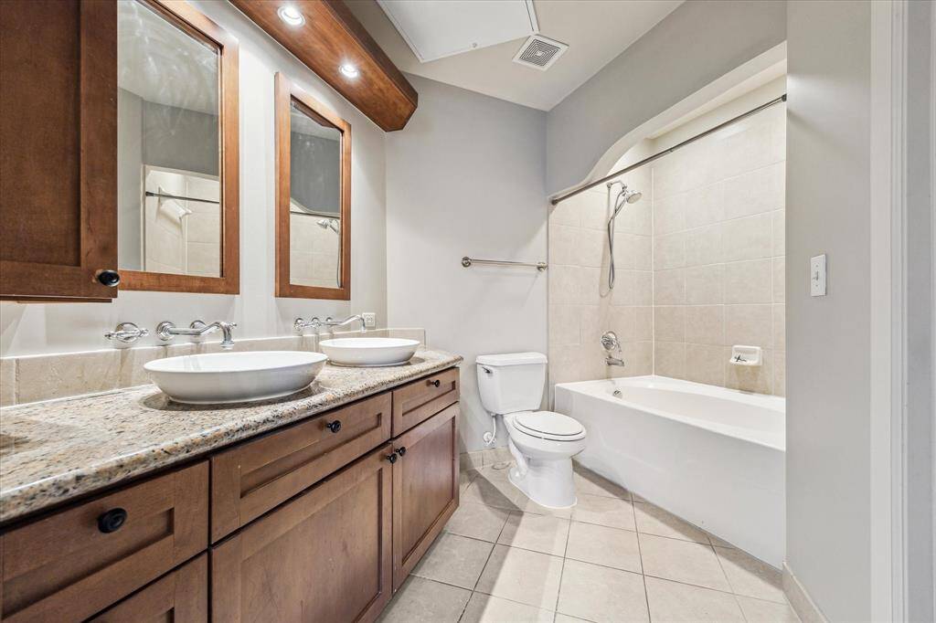 Enjoy the ease and privacy of a spacious ensuite bath, complete with dual sinks and a relaxing soaking tub/shower combo—offering ultimate comfort and everyday convenience right off the primary bedroom.