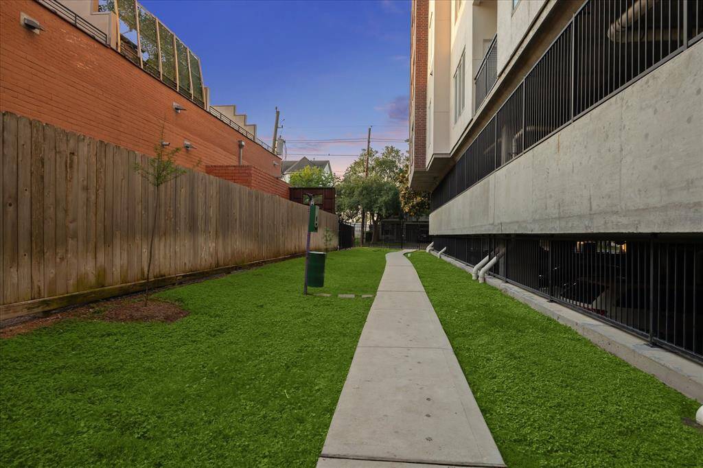 A third greenspace complete with a dog clean-up station.  Even your pooch will love living here!