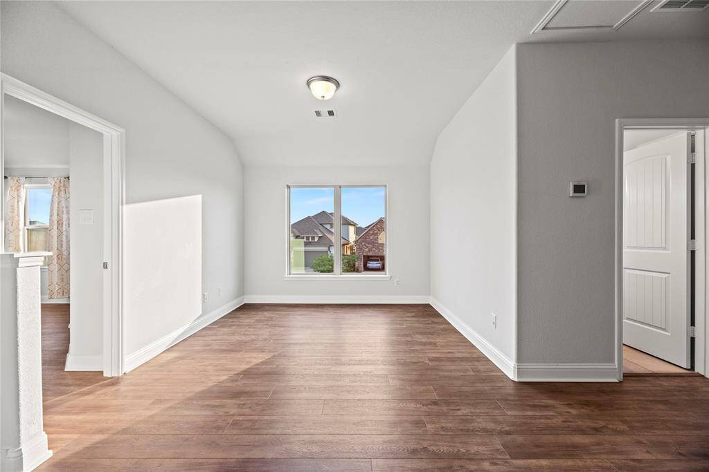 Upstairs game room area between the bedrooms.