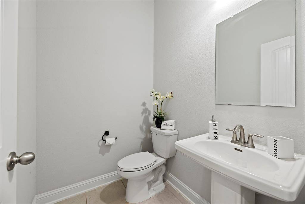 Downstairs half bathroom.