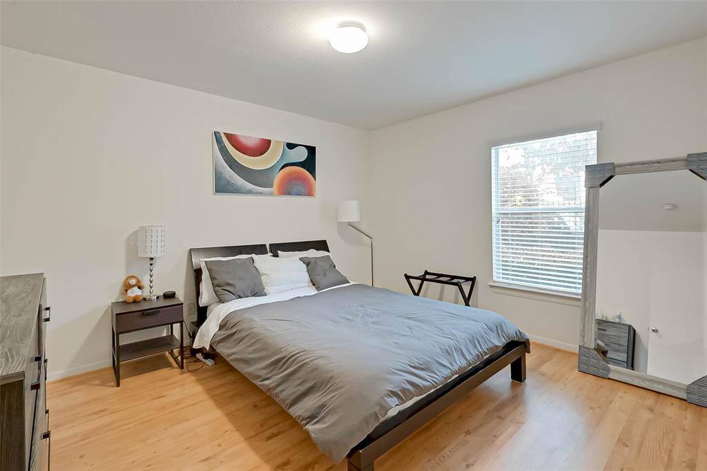 The 1st floor has direct access to the garage and green space and a full bedroom and bath.