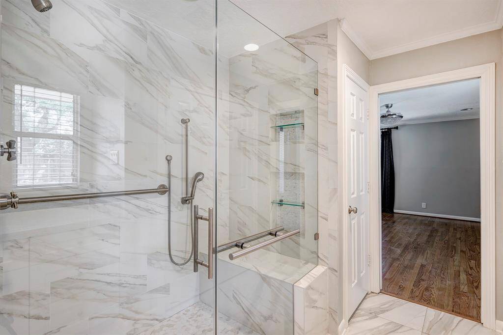 Wow! Love this oversized shower with two shower heads. Sit and bathe.