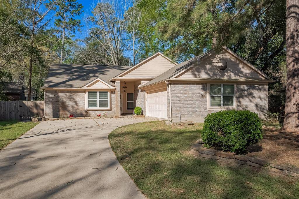 Side load garage with wide driveway