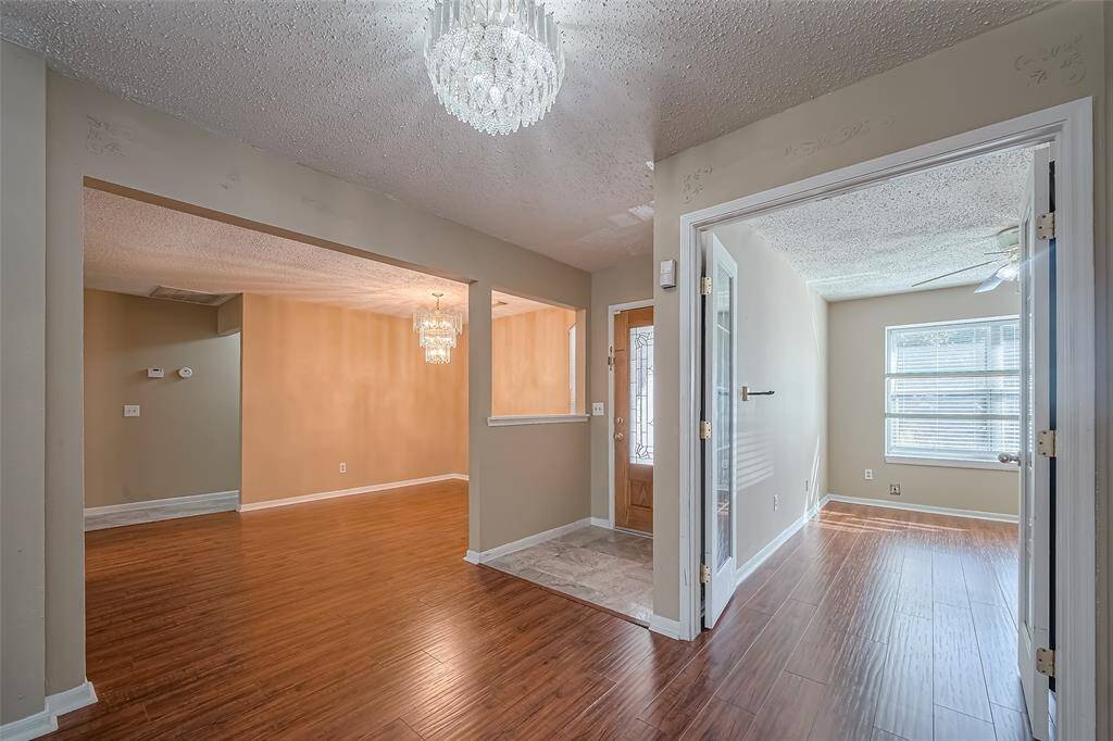 Dinning room to left, home office to right of entry