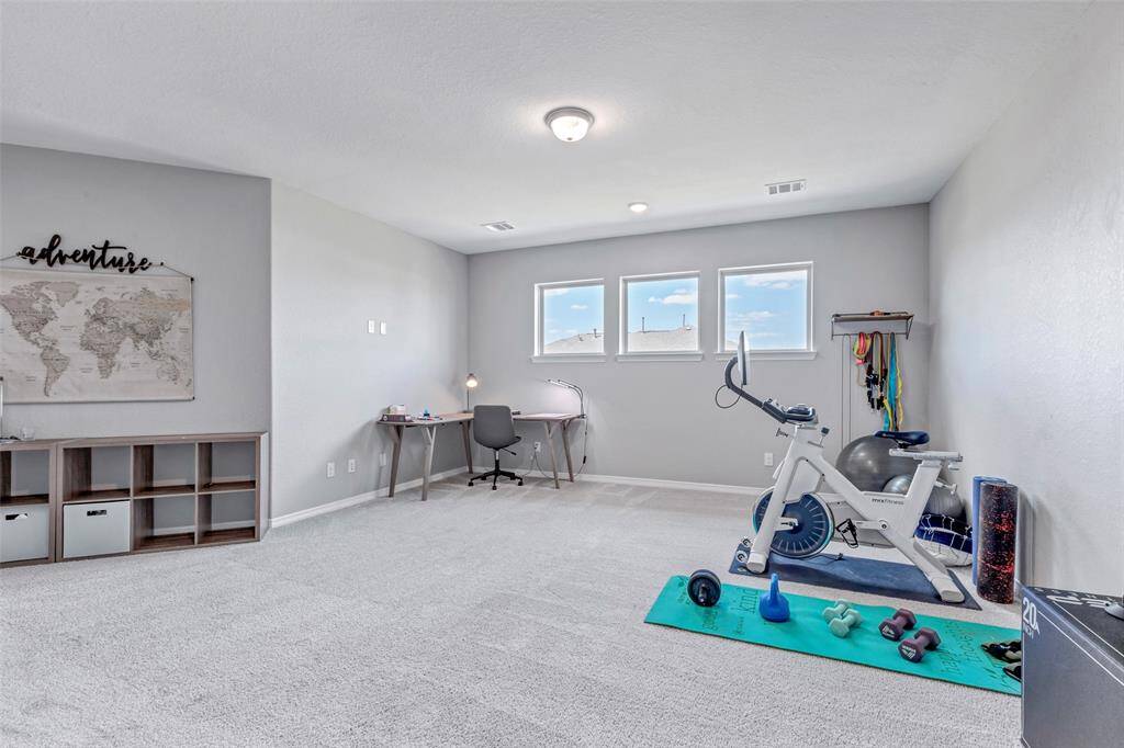Natural light filled upstairs game-room