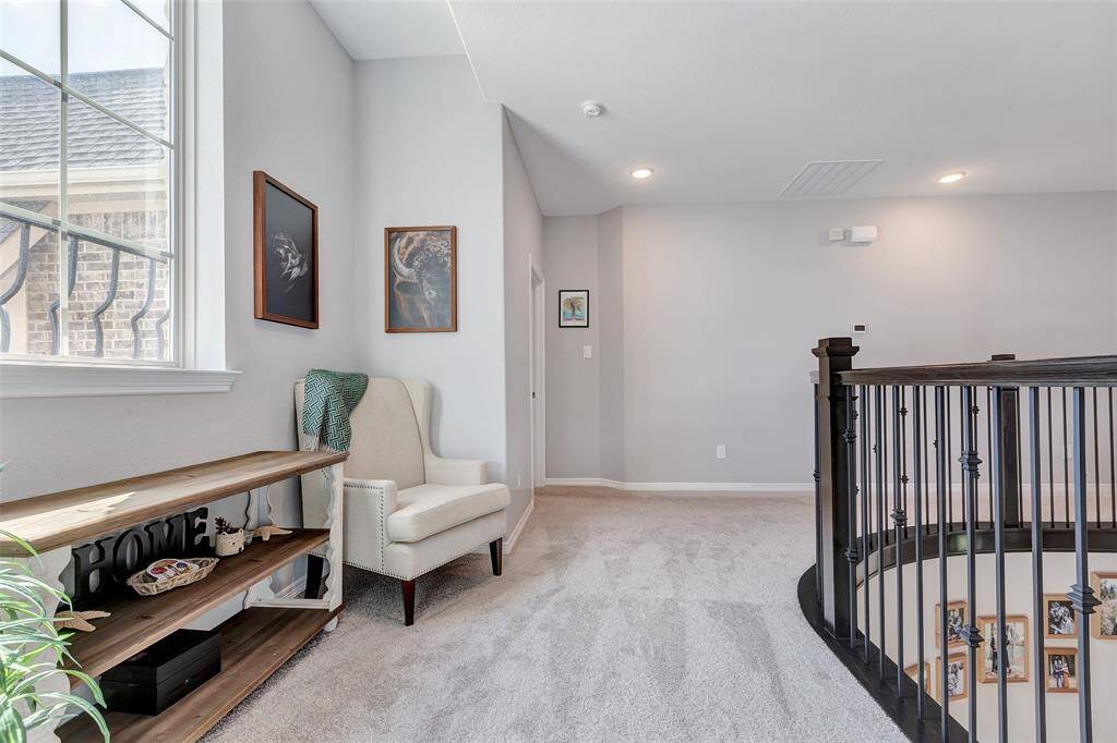 Sitting area in between the upstairs secondary bedrooms