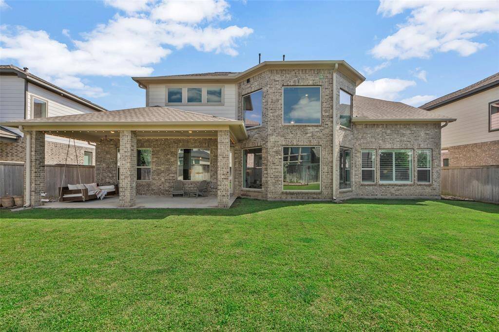 Beautiful elevation of the home with gutters all around