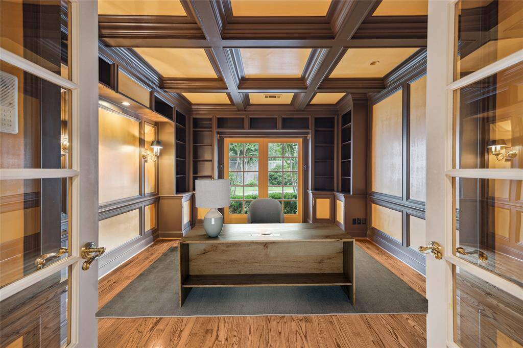 Private study with outdoor views. (virtually staged)