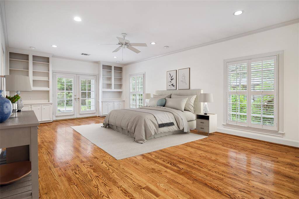 Spacious primary bedroom is a private retreat. (virtually staged)