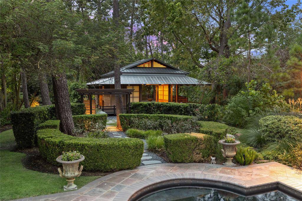 The approach through the manicured gardens sets the tranquil mood of the Zen Pavilion.