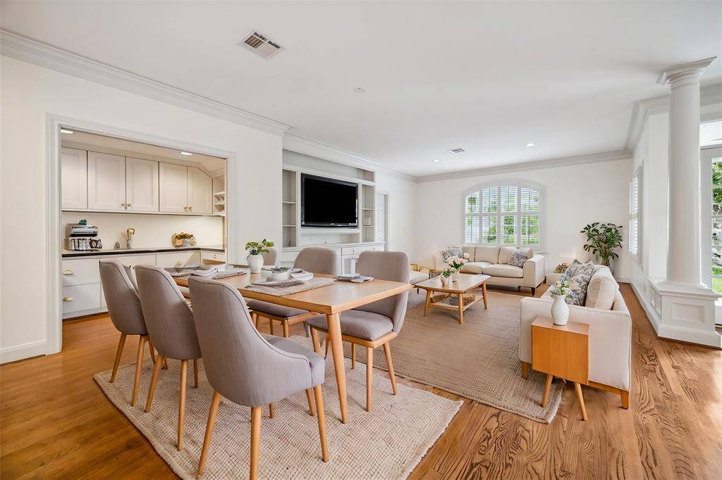 Family room and home office with pocket doors. (virtually staged)