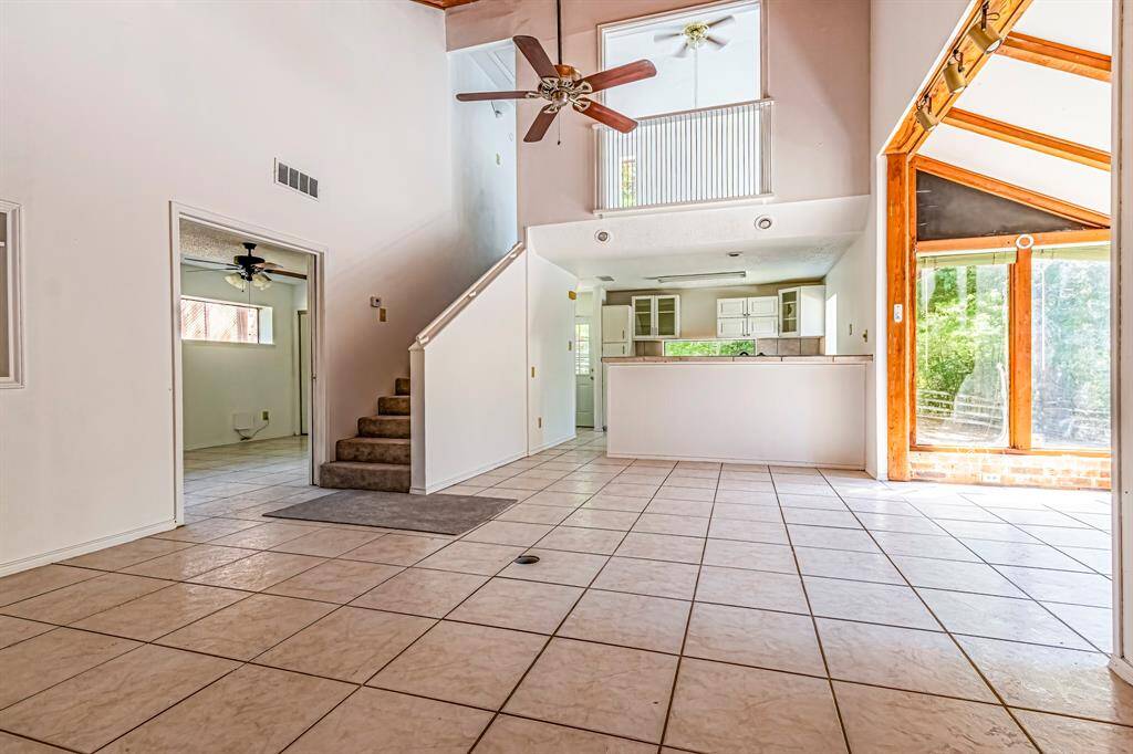 Living area taken fromt he kitchen. The area on the right is the sun room