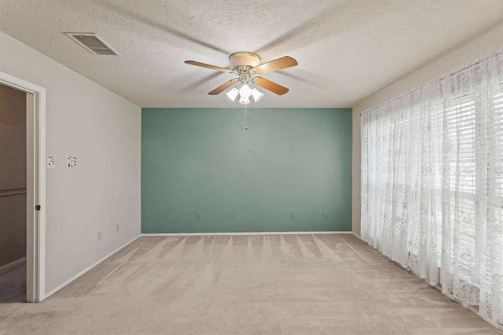 Primary Bedroom. Located near the back of the home.