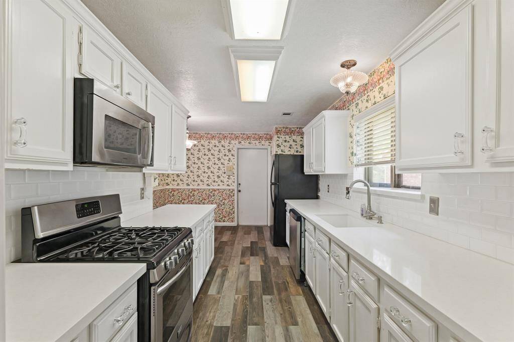 Updated countertops and appliances.