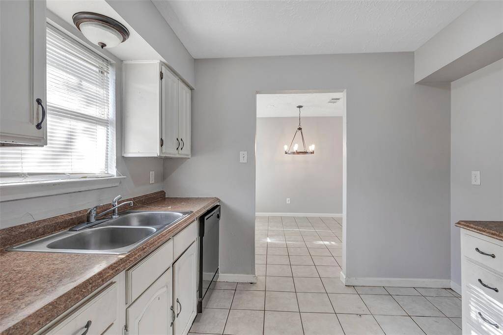 Additional view of the kitchen.