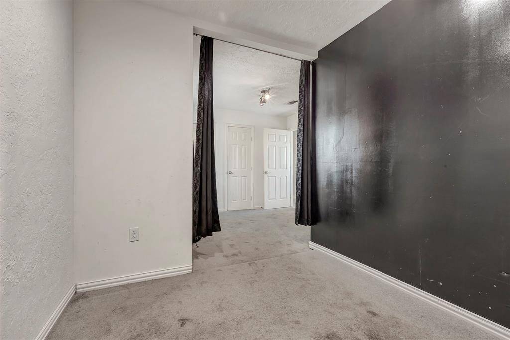 Take a look inside the walk-in closet, offering plenty of space and organization.