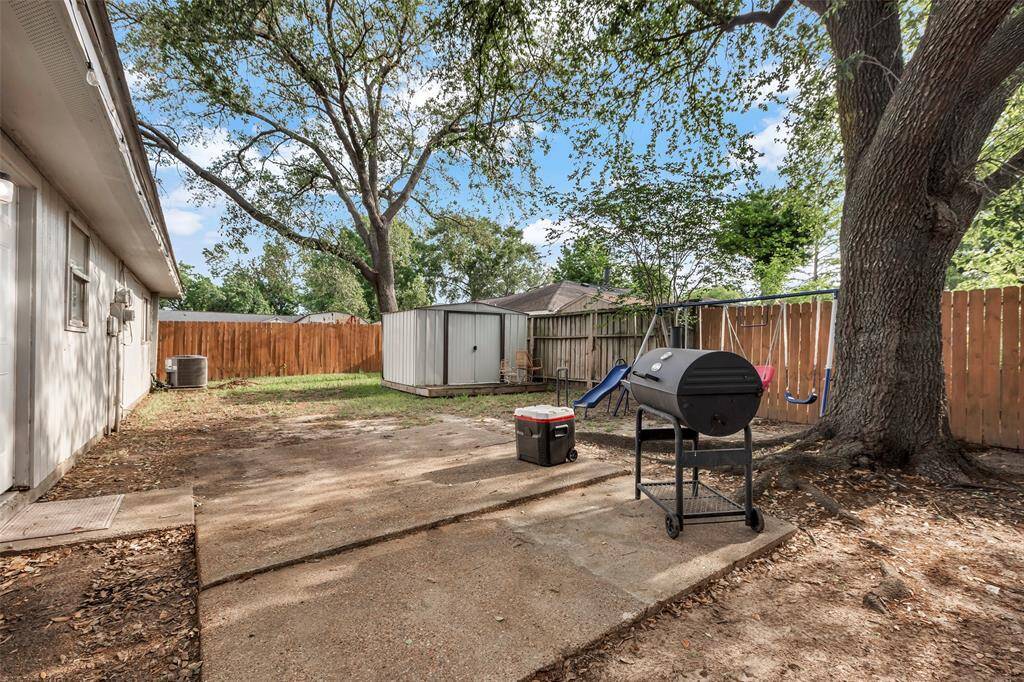 Step outside to the backyard, a private retreat enclosed by a tall wooden fence. This secluded space offers a peaceful environment for outdoor relaxation, gardening, or entertaining, all within the comfort of your own home.