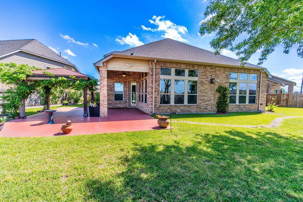 Enjoy the outdoors with dual patios, a stunning gazebo, and a soothing water fountain. Ideal for family moments.