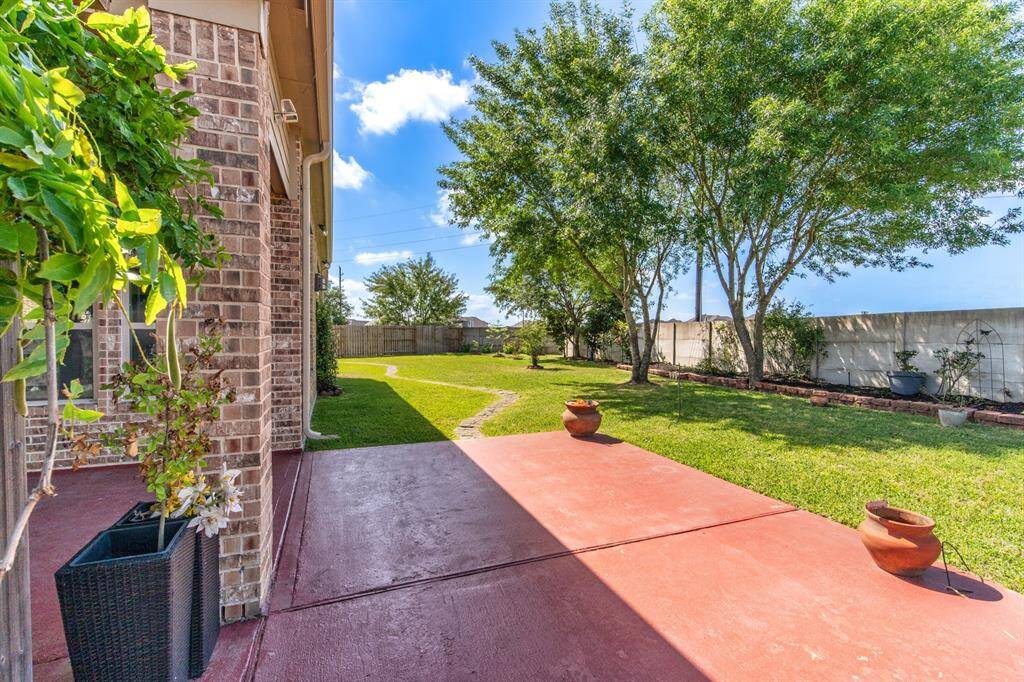 A view of the extended space offered by the gazebo outdoors.