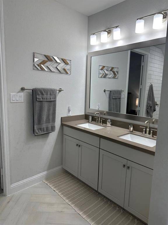 Primary bath featuring an extra-large tile walk-in shower for a spa-like experience.