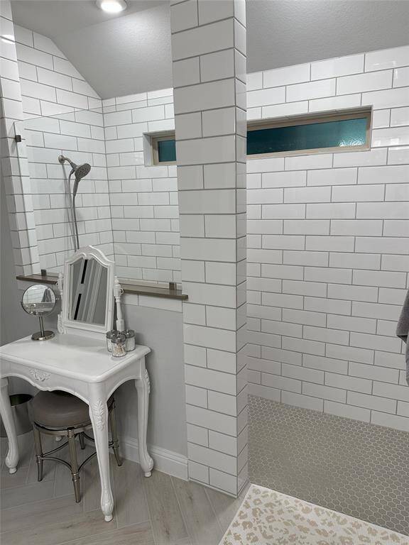Ample under-sink storage in the primary bath, perfect for organizing all your beauty products and essentials.